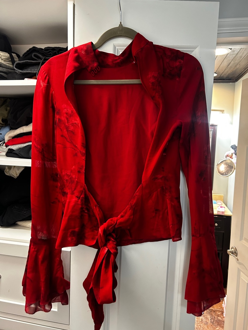 Roxana top in a vermillion red floral print, featuring a mock neck & flutter sle - Picture 13 of 13